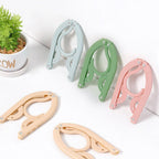 Folding Travel Clothes Hangers Four Colours | StorageOZ